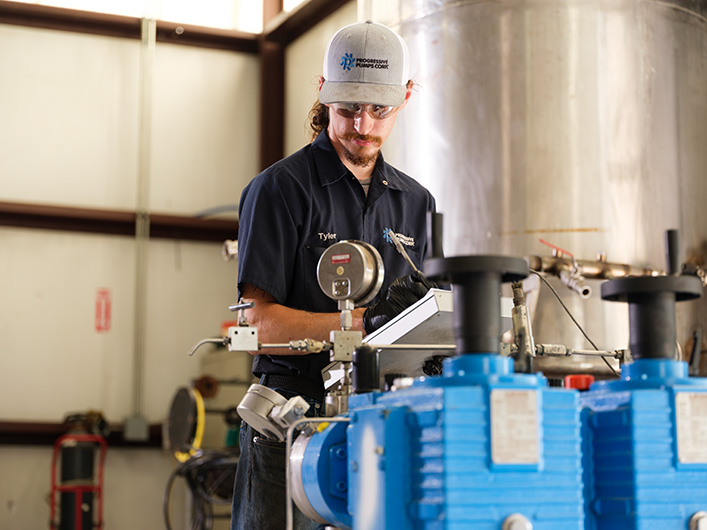 A photo of an employee filling out documentation